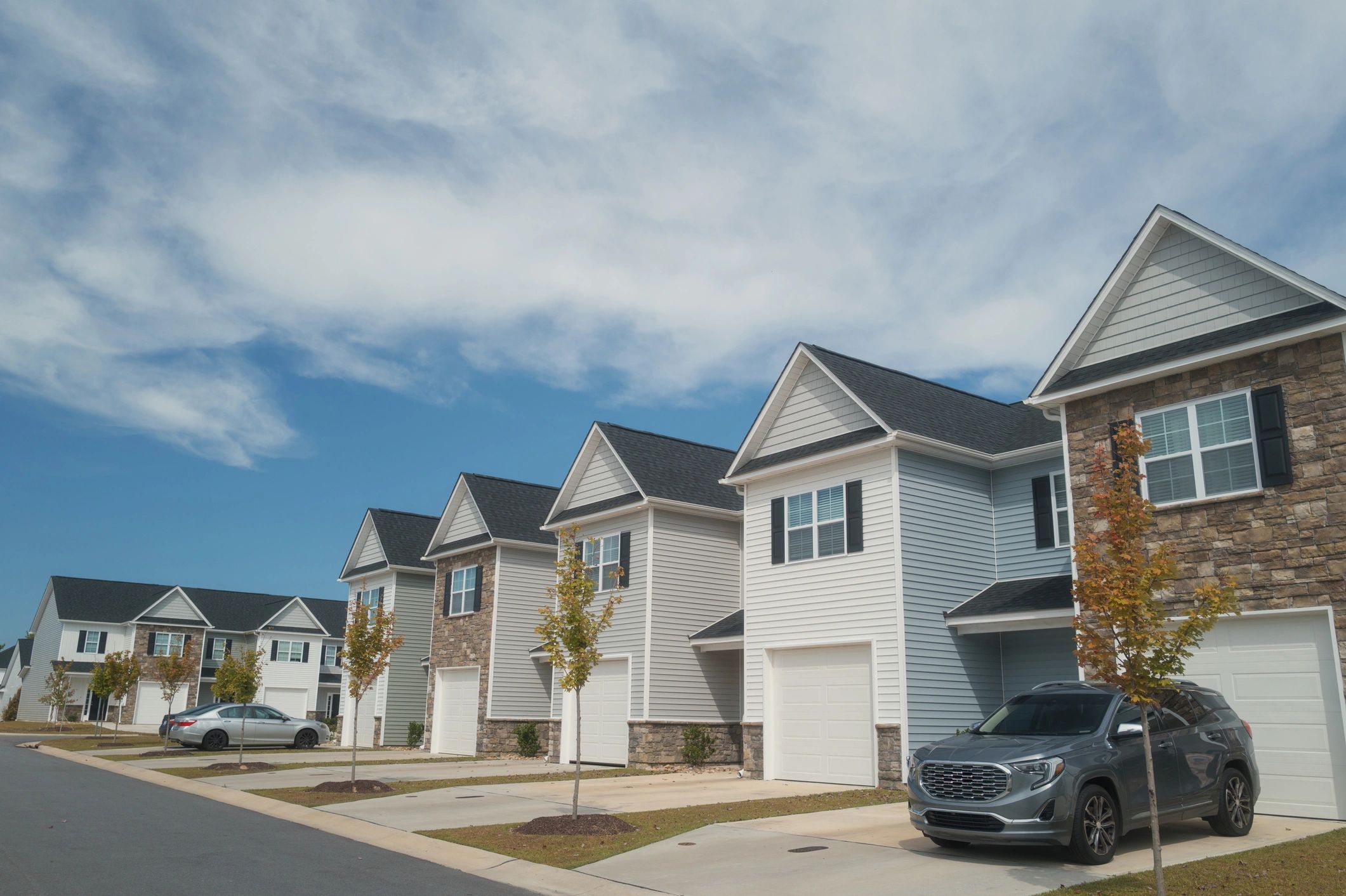Completed townhouses representing apartment and multifamily development
